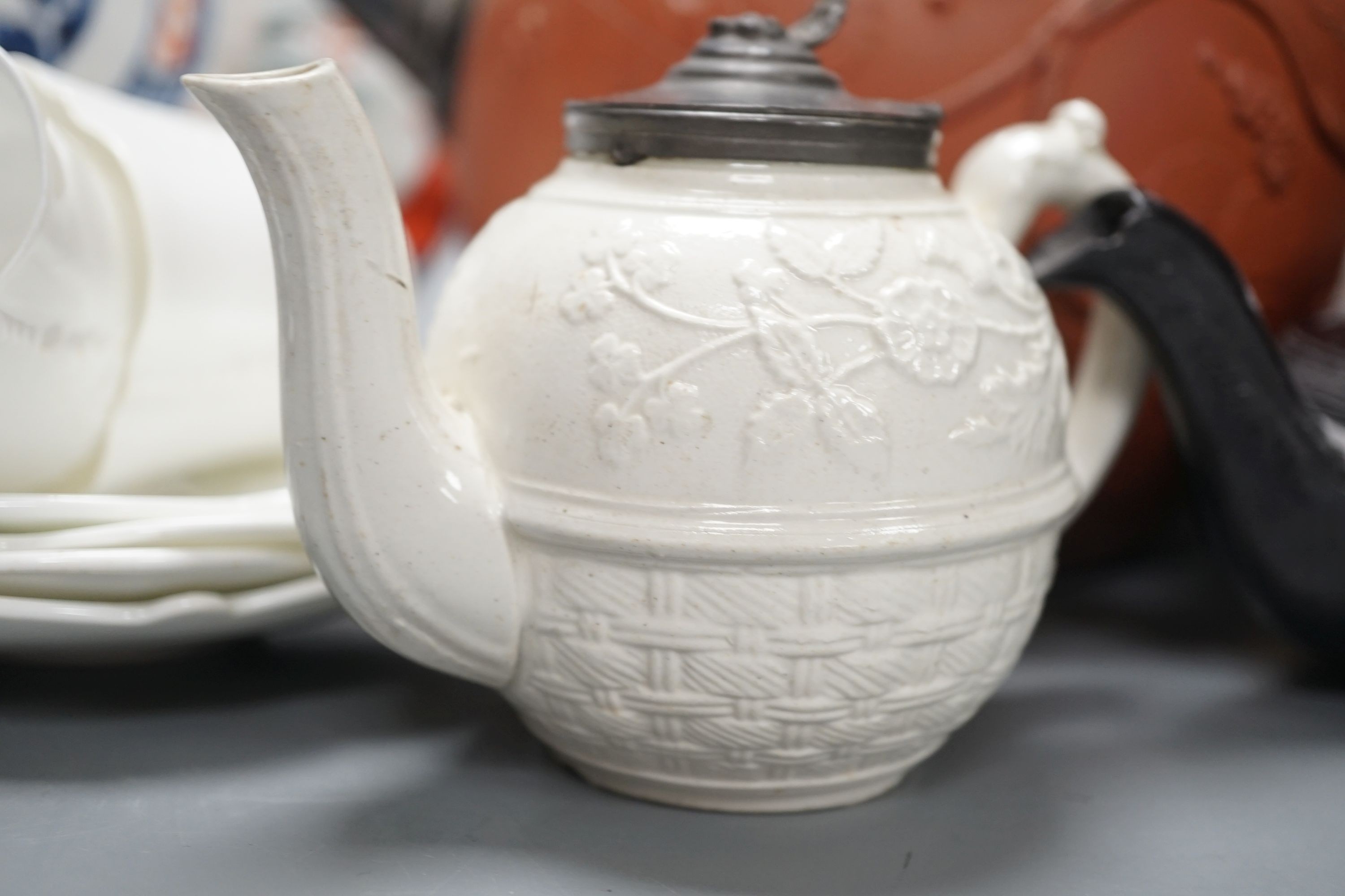 Four 19th century black basalt or black glazed pottery teapots, a large red ware teapot, a creamware dish and a Royal Worcester pot pourri, and other ceramics, tallest 27.5cm